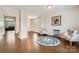 Open concept living room boasting hardwood floors, neutral paint, and an inviting atmosphere at 4151 Granite St, Midland, NC 28107