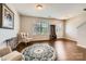 Cozy living room featuring hardwood floors, natural light, and comfortable seating arrangements at 4151 Granite St, Midland, NC 28107