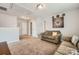 Upstairs loft featuring neutral colored walls, carpet flooring, and a comfortable seating area at 4151 Granite St, Midland, NC 28107