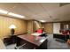 Finished basement with paneled walls, featuring ample space for recreation or storage at 4330 Rowell Rd, Lancaster, SC 29720
