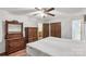 Inviting bedroom features warm wood furniture, a ceiling fan, and a neutral color scheme at 4330 Rowell Rd, Lancaster, SC 29720