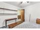 Bedroom featuring a neutral wall with built in shelves and a peak into the next room at 4330 Rowell Rd, Lancaster, SC 29720