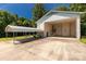 Spacious carport offers covered parking and convenient access to the home, featuring a full walk-up basement at 4330 Rowell Rd, Lancaster, SC 29720