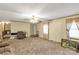 Comfortable living room with neutral walls, plush carpeting, and large windows for natural light offering a cozy feel at 4330 Rowell Rd, Lancaster, SC 29720