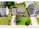 Aerial view of a well-maintained home with a large, green backyard and a pool at 4469 Greystone Sw Dr, Concord, NC 28027