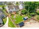 Aerial view of backyard, featuring a wooden deck and well manicured lawn at 4469 Greystone Sw Dr, Concord, NC 28027