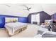 Unique bedroom featuring a sitting area, ceiling fan, two-tone walls, and carpeted floor at 4469 Greystone Sw Dr, Concord, NC 28027