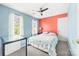Inviting bedroom featuring colorful walls, carpeted floors, and lots of natural light at 4469 Greystone Sw Dr, Concord, NC 28027