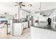 Spacious kitchen with stainless steel appliances, granite countertops, and open layout into living areas at 4469 Greystone Sw Dr, Concord, NC 28027