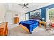 Spacious primary bedroom featuring a tray ceiling, and a scenic accent wall at 4469 Greystone Sw Dr, Concord, NC 28027