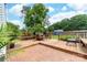 Spacious patio with outdoor seating, ideal for relaxing and entertaining at 4469 Greystone Sw Dr, Concord, NC 28027