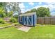 Charming shed nestled in a garden setting, enhancing outdoor appeal at 4469 Greystone Sw Dr, Concord, NC 28027