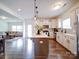 Modern kitchen with an island, stainless steel appliances, and an open layout at 5121 Arbordale Way, Mount Holly, NC 28120