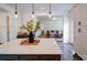 A kitchen with a large island that opens to the living room, perfect for entertaining at 5121 Arbordale Way, Mount Holly, NC 28120