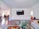 Open-concept living area with tv on the wall at 5121 Arbordale Way, Mount Holly, NC 28120