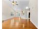 Bright living room featuring hardwood floors, high vaulted ceilings, and lots of natural light at 5707 Sustar Dr, Monroe, NC 28110