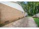 Home exterior featuring a brick facade and concrete driveway at 6215 Cross Creek Ln, Charlotte, NC 28212