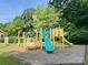 Community playground area includes colorful play structures and ample space for children to enjoy at 6215 Cross Creek Ln, Charlotte, NC 28212