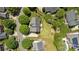 Aerial view showcasing the home's backyard, deck, driveway, landscaping, and surrounding neighborhood layout at 6803 Augustine Way, Charlotte, NC 28270