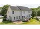 Spacious backyard showcasing a patio and deck, providing ample space for outdoor living and entertaining at 6803 Augustine Way, Charlotte, NC 28270