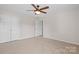 Bedroom with ceiling fan and closet at 6803 Augustine Way, Charlotte, NC 28270