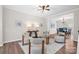 Comfortable living room with stylish decor, including modern seating, hardwood floors, and an open layout at 6803 Augustine Way, Charlotte, NC 28270