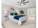 Relaxing main bedroom with ceiling fan and ensuite bathroom at 6803 Augustine Way, Charlotte, NC 28270