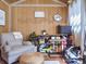 Relaxing interior space with a chair, wooden walls and stylish decor at 7700 Antique Cir, Waxhaw, NC 28173