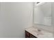 Bathroom featuring vanity with sink, neutral color palette, and bright lighting at 858 Rook Rd, Charlotte, NC 28216