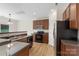Updated kitchen features stainless appliances, granite counters and wood cabinets at 858 Rook Rd, Charlotte, NC 28216