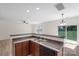 Eat-in kitchen with granite counters, wood cabinets and stainless steel appliances at 858 Rook Rd, Charlotte, NC 28216