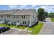 Inviting townhome featuring a well-manicured lawn and convenient parking at 9001 Lanark Ln, Fort Mill, SC 29707