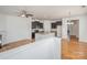 Open floor plan featuring living room, granite island in kitchen at 9001 Lanark Ln, Fort Mill, SC 29707