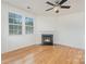 Bright living room with fireplace and hardwood floors at 9001 Lanark Ln, Fort Mill, SC 29707