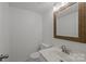 Bathroom featuring modern sink, toilet and mirror at 906 Wishing Well Ln, Charlotte, NC 28270