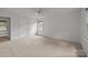 Bedroom featuring carpeted floor, white trim, and a ceiling fan at 906 Wishing Well Ln, Charlotte, NC 28270