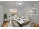 Elegant dining room featuring a marble table and stylish decor at 906 Wishing Well Ln, Charlotte, NC 28270