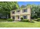 Well-kept home with green shutters, a brick chimney, and a lush green lawn at 906 Wishing Well Ln, Charlotte, NC 28270