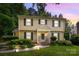 Charming two-story home featuring traditional architecture, a well-manicured lawn, and inviting front porch at 906 Wishing Well Ln, Charlotte, NC 28270