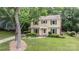 Charming two-story home with well-maintained lawn and mature trees at 906 Wishing Well Ln, Charlotte, NC 28270
