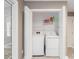 A convenient laundry room with modern appliances and ample storage space at 9908 Park Springs Ct, Charlotte, NC 28210