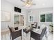 Inviting sunroom with comfortable seating, natural light, and access to an outdoor view at 9908 Park Springs Ct, Charlotte, NC 28210