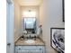 Charming half bath with granite countertops and decorative mirror at 113 Foxfield Ln, Matthews, NC 28105