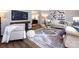 Living room with modern decor, stylish furnishings, and large area rug at 113 Foxfield Ln, Matthews, NC 28105