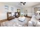 Bright living room with stylish decor, modern furnishings, and ample natural light at 113 Foxfield Ln, Matthews, NC 28105