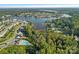 Stunning aerial view showcasing the lakefront community and the sparkling blue pool at 114 Canoe Pole Ln, Mooresville, NC 28117