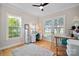 Bright room with multiple windows for ample light, ideal for office space at 114 Canoe Pole Ln, Mooresville, NC 28117