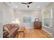 Cozy living room showcasing a comfortable couch, wooden accents, and plenty of natural light at 114 Canoe Pole Ln, Mooresville, NC 28117