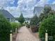 Landscaped walkway leading to the waterfront, providing a scenic connection to the water at 114 Canoe Pole Ln, Mooresville, NC 28117