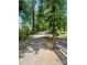 Scenic wooded walking trail with bench seating at 114 Canoe Pole Ln, Mooresville, NC 28117